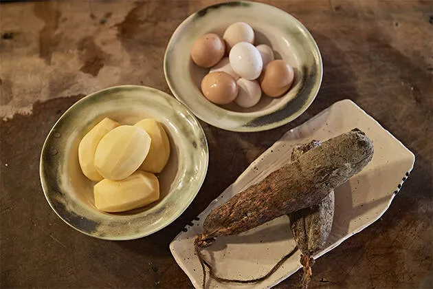 Frito de langosta de Formentera con patatas pebrera y huevo frito