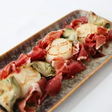 Receta de alcachofas con vieiras y jamón ibérico