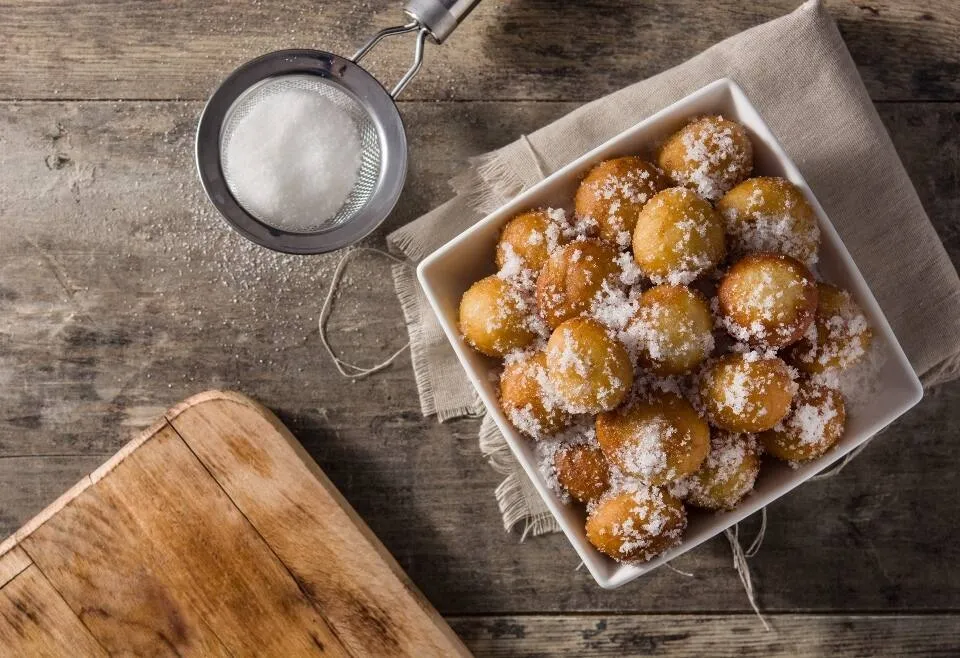 Origen y receta clásica de los buñuelos de viento