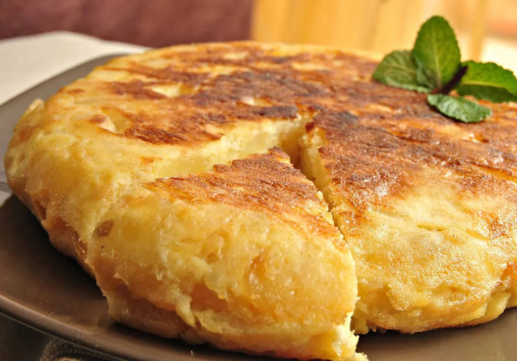 Tortilla de patatas, la preferimos rubia y bien rubia