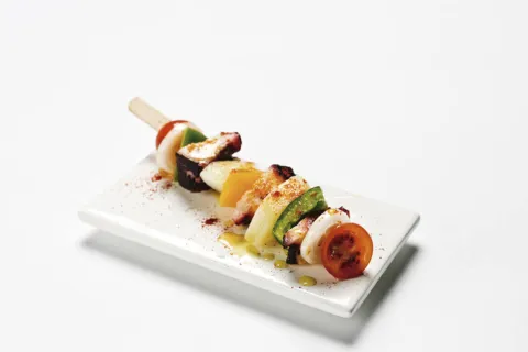 Brocheta de pulpo con vinagreta