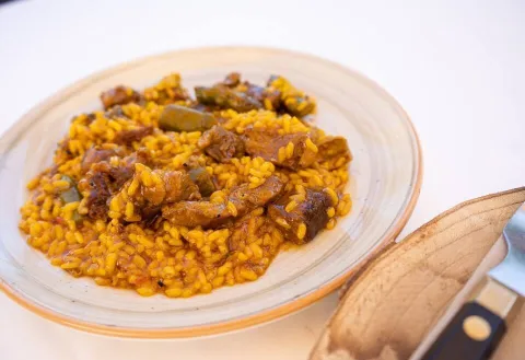 Arroz meloso con pluma ibérica, foie y trigueros