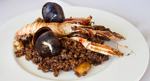 Receta de arroz Ca la Nuri, una paella personalizada